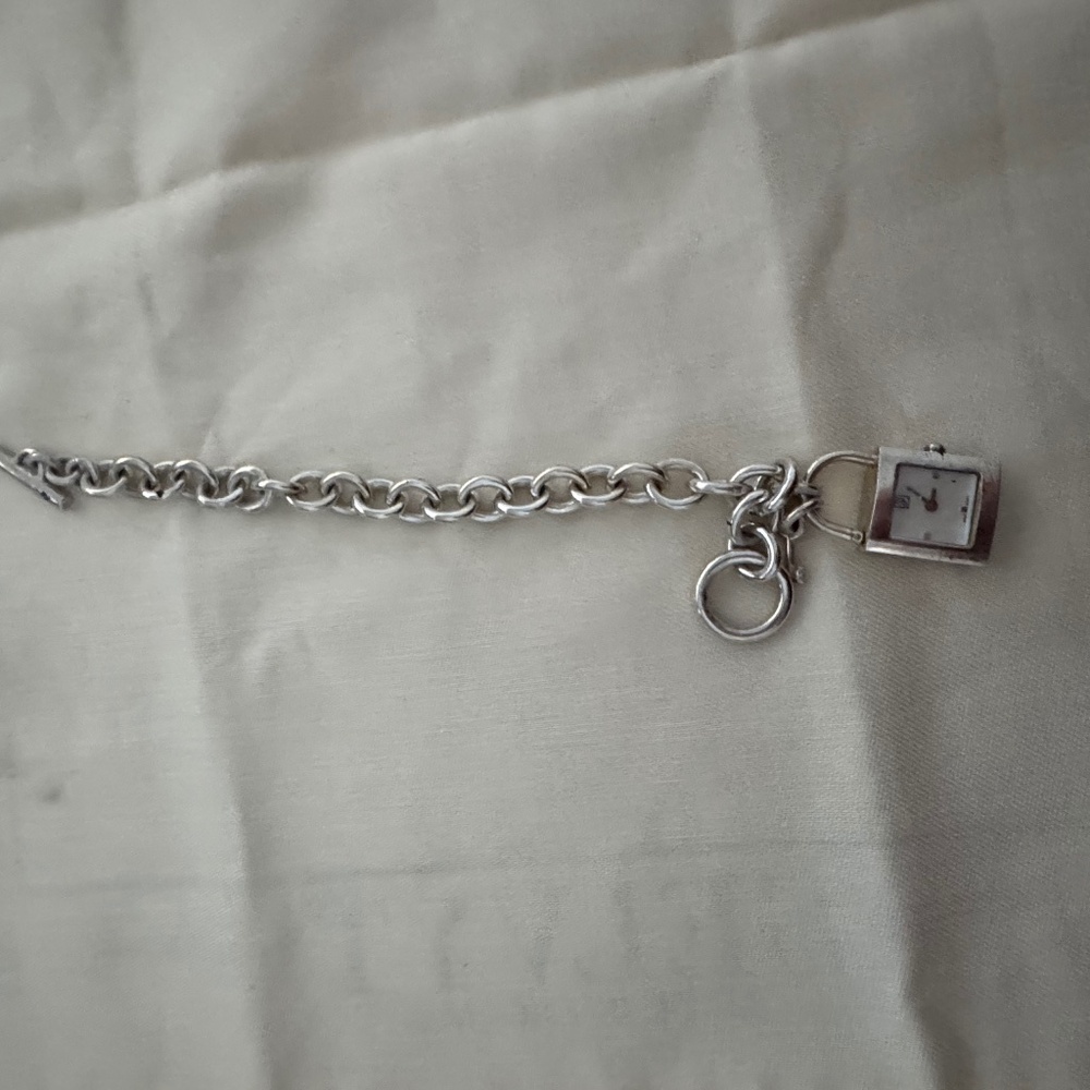 ESQ Movado lock & key charm bracelet ladies watch